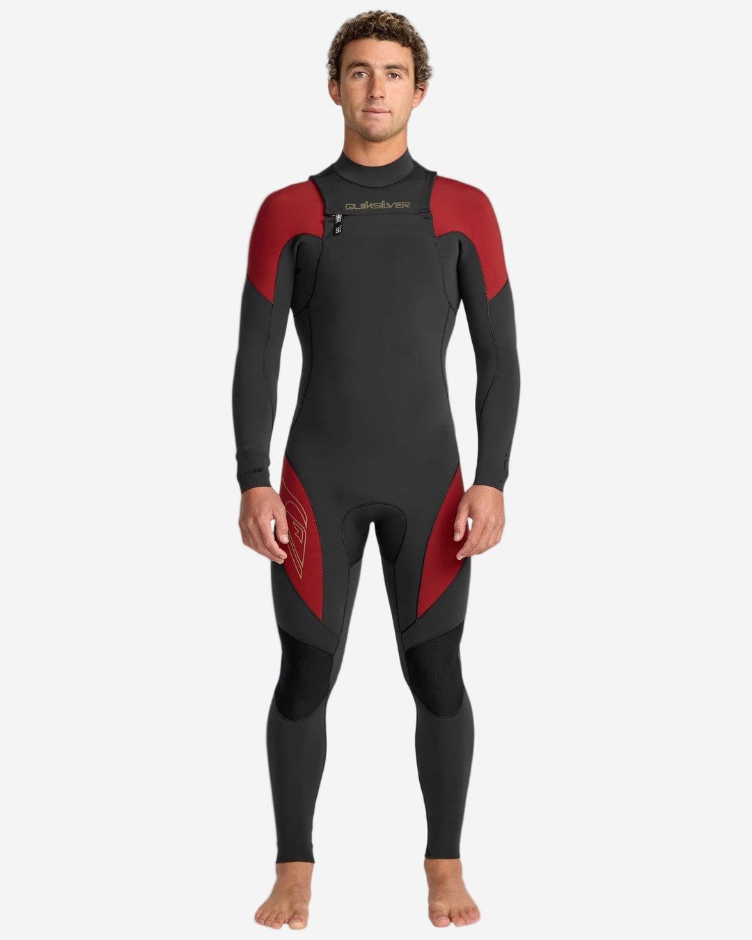 Man wearing a black and red wetsuit on a white background