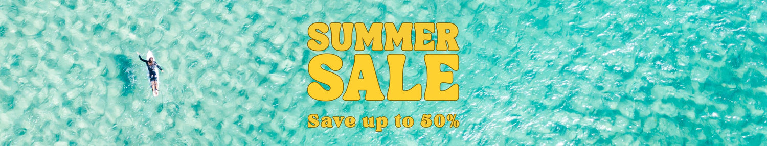 Summer sale written on aqua water